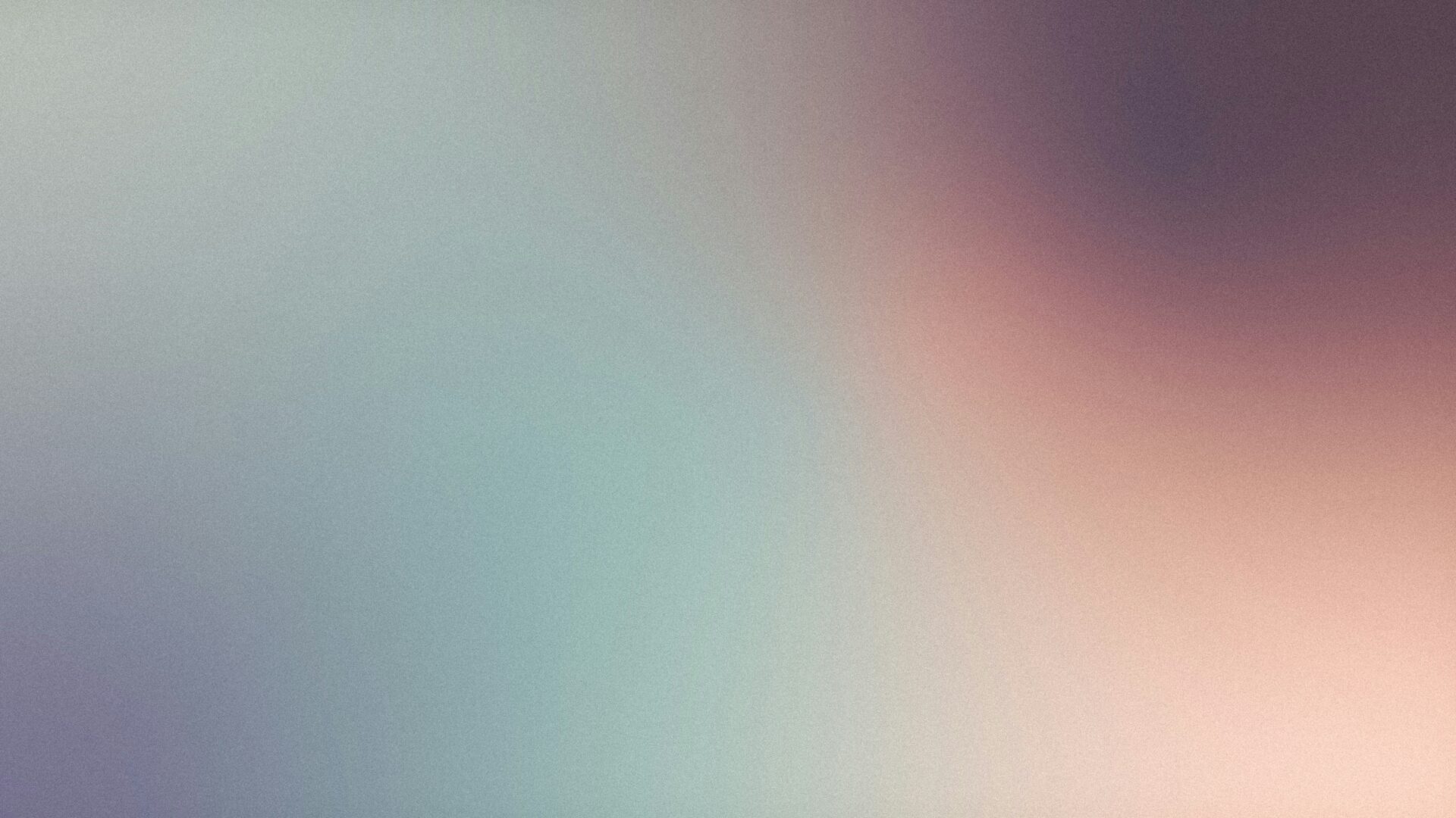 Weiches, verschwommenes Farbmuster in sanften Tönen von Blau, Grau und Rosa, ideal für Hintergründe oder kreative Designs.