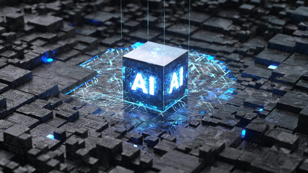 Grafik eines schwebenden Würfels mit der Aufschrift "AI" vor einem futuristischen, digitalen Hintergrund aus schwarzen und blauen geometrischen Formen, der künstliche Intelligenz symbolisiert.